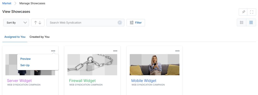 View Showcases page in Thumb View showing Server Widget, Firewall Widget, and Mobile Widget showcase cards under Assigned to You tab